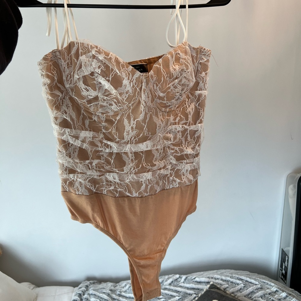 Tan and white lace bodysuit